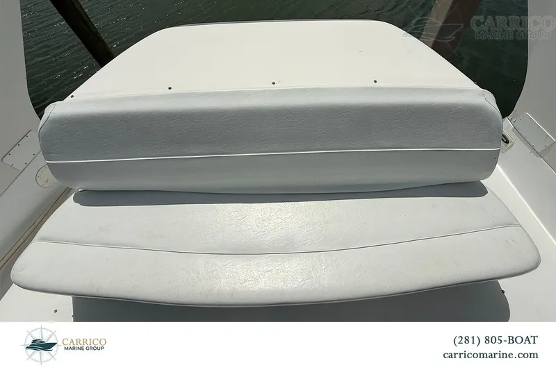 Slide: The Image of White seating on a 2000 Carver 350 Mariner boat, Carrico Marine Group. - 21