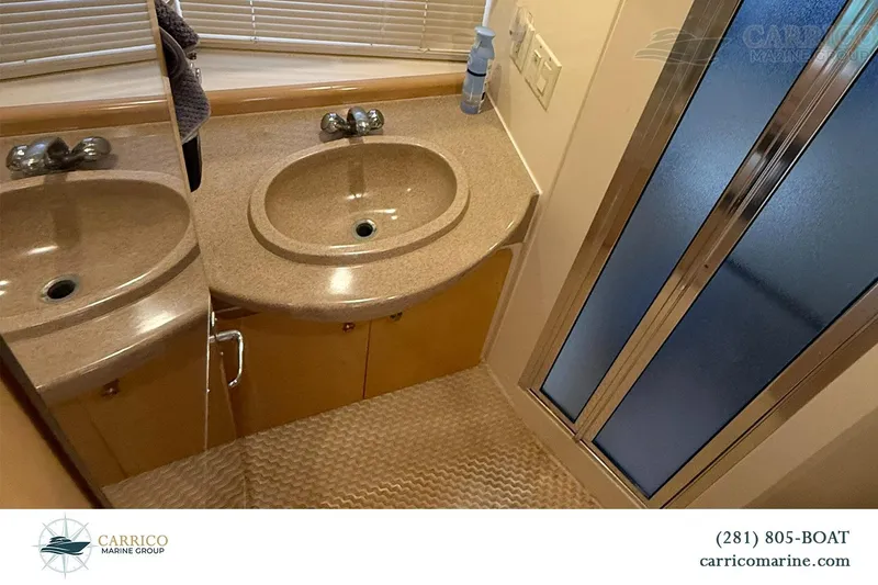 Slide: The Image of Bathroom interior of 2000 Carver 350 Mariner yacht with sink and shower. - 33