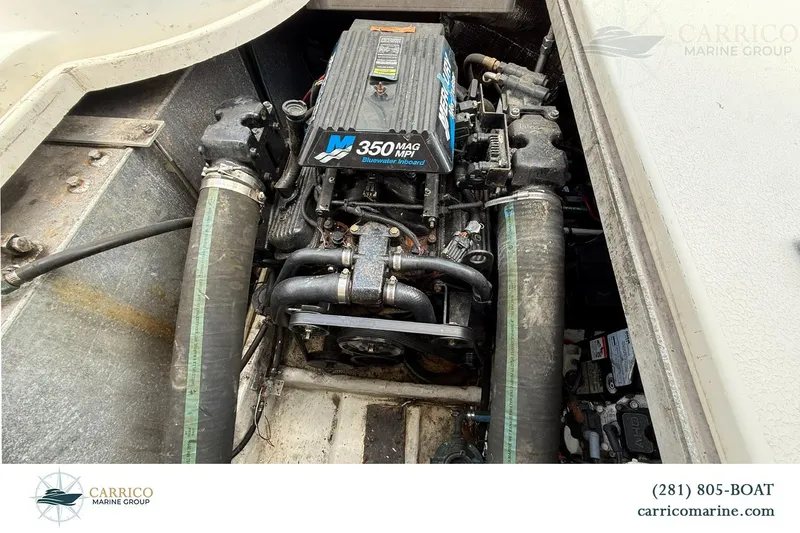 Slide: The Image of Engine compartment of a 2000 Carver 350 Mariner with 350 MAG MPI motor. - 40
