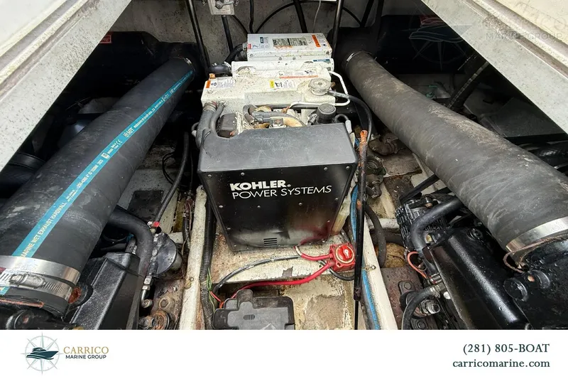 Slide: The Image of Engine compartment of 2000 Carver 350 Mariner with Kohler power system. - 41