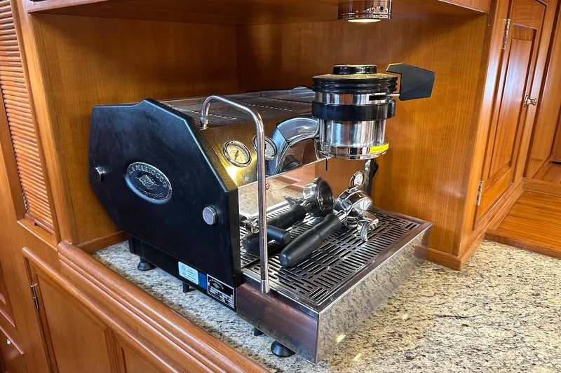 Slide: The Image of Espresso machine on granite countertop in a 2012 Hylas 56 yacht interior. - 28