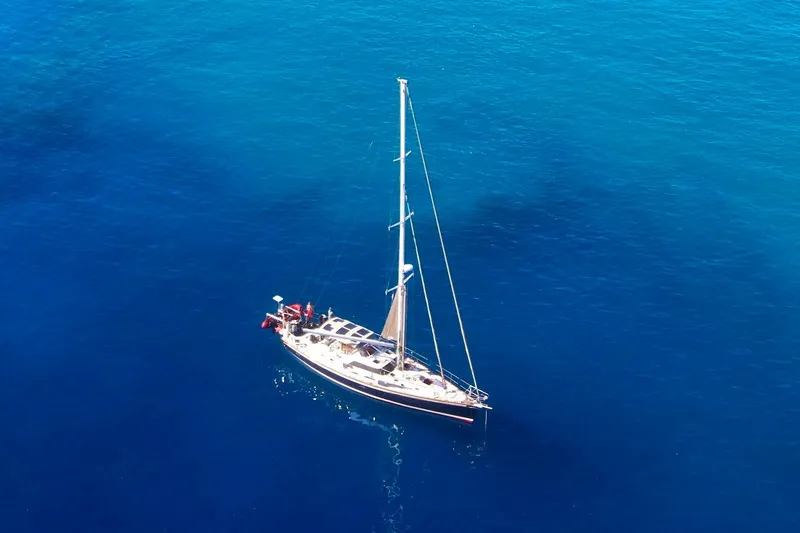 Slide: The Image of Sailing yacht Hylas 56 (2012) cruising on clear blue ocean waters. - 7