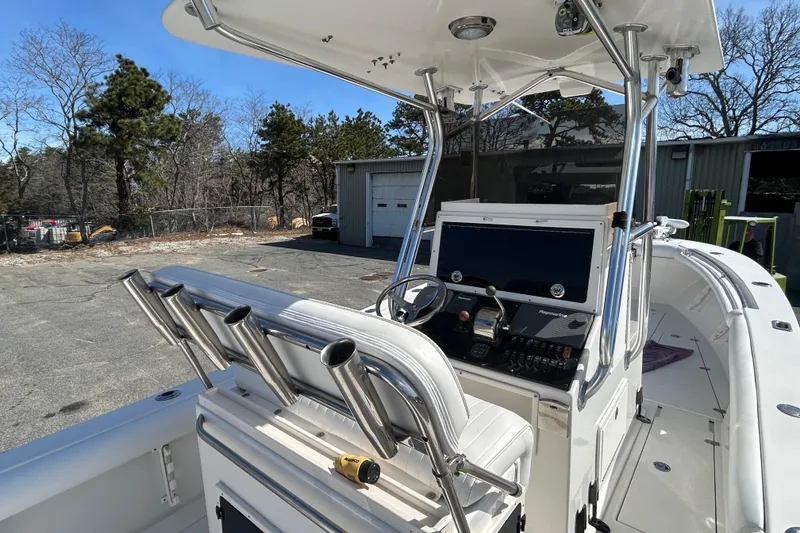 Slide: The Image of 2006 Albin 26 Center Console boat with sleek design and modern controls. - 13