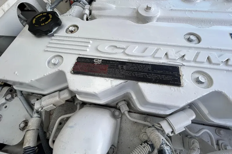 Slide: The Image of Engine of a 2006 Albin 26 Center Console boat, featuring Cummins branding. - 41
