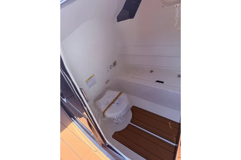 Slide: The Image of 2026 Brig Eagle 8 boat interior with modern design and wooden flooring accents. - 7