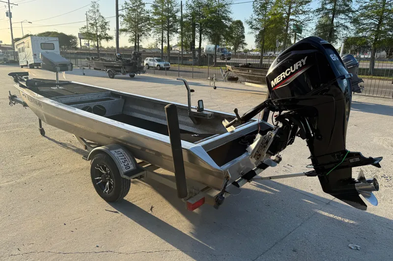 Slide: The Image of 2017 Homemade 1754 boat with Mercury outboard motor on trailer in outdoor setting. - 7