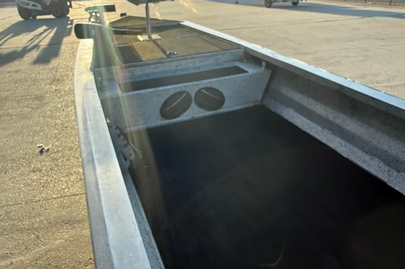 Slide: The Image of 2017 Homemade 1754 boat interior with sunlight, showcasing seating and storage areas. - 8