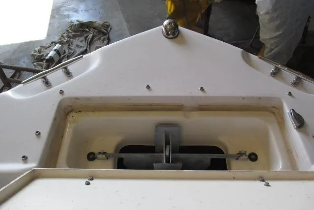 Slide: The Image of 2009 Grady-White Tournament 205 boat anchor compartment, showcasing storage and hardware details. - 10