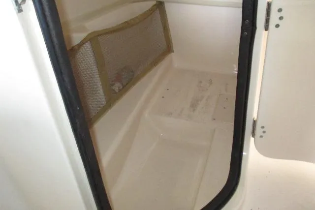 Slide: The Image of Interior storage compartment of 2009 Grady-White Tournament 205 boat. - 12