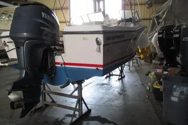 Slide: The Image of 2009 Grady-White Tournament 205 boat with Yamaha outboard in storage facility. - 16
