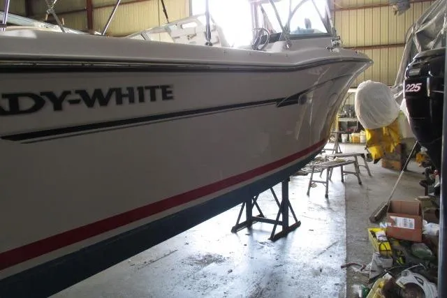 Slide: The Image of 2009 Grady-White Tournament 205 boat in a workshop, side view. - 17