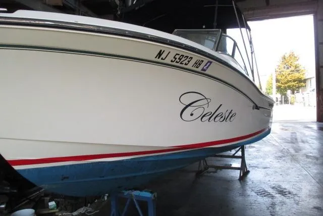 Slide: The Image of 2009 Grady-White Tournament 205 boat named "Celeste" in a garage, New Jersey registration. - 21