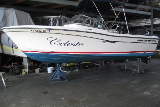 Slide: The Image of 2009 Grady-White Tournament 205 boat named "Celeste" in storage, side view. - 24