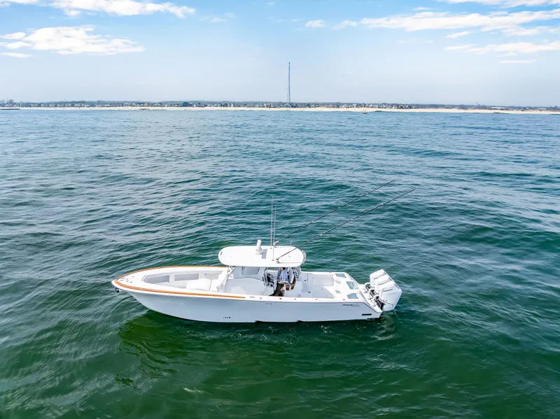 Slide: The Image of 2026 Front Runner 39 Center Console on open sea. - 11