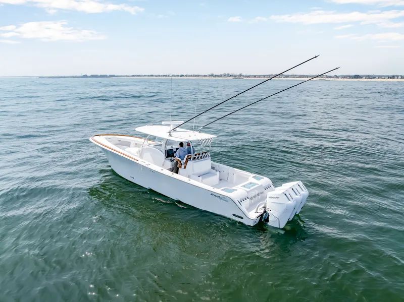 Slide: The Image of 2026 Front Runner 39 Center Console on open sea. - 12