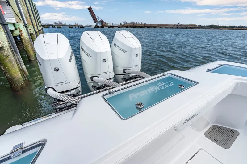 Slide: The Image of 2026 Front Runner 39 Center Console with Mercury engines at dock. - 22