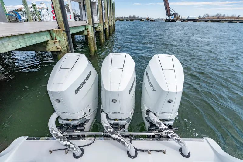 Slide: The Image of Three Mercury engines on 2026 Front Runner 39 Center Console boat. - 26