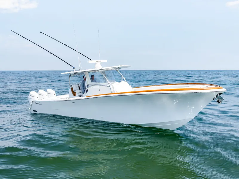 Slide: The Image of Front Runner 39 Center Console boat on open sea, year 2026. - 4