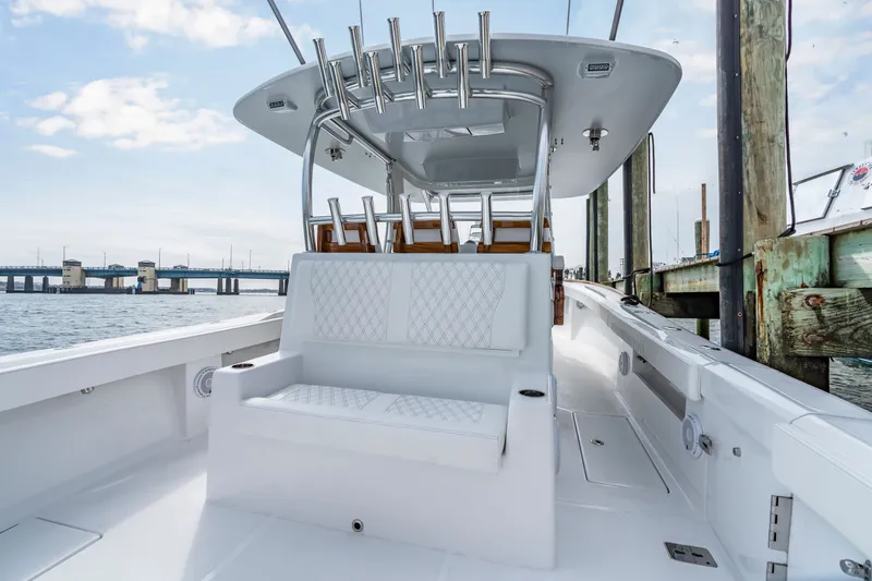 Slide: The Image of Front Runner 39 Center Console boat, 2026 model, docked by the water. - 43