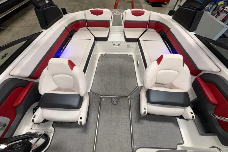 Slide: The Image of 2019 Chaparral Vortex 2430 VRX Wake Series boat interior with red and white seating. - 17