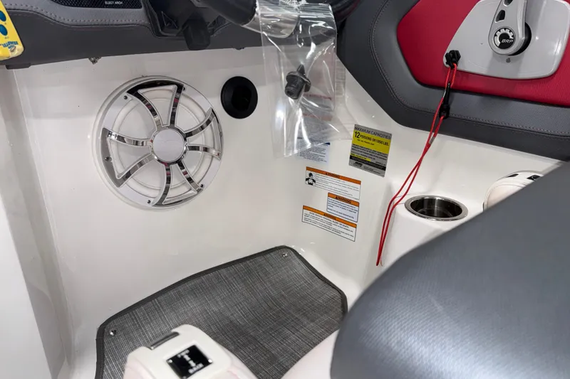 Slide: The Image of Interior of 2019 Chaparral Vortex 2430 VRX Wake Series boat with speaker and controls. - 21