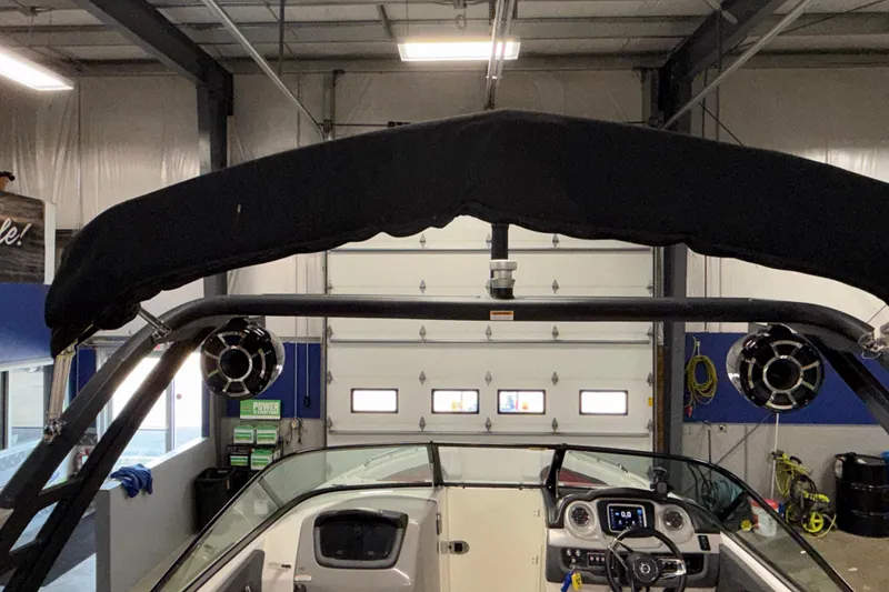 Slide: The Image of 2019 Chaparral Vortex 2430 VRX Wake Series boat interior with speakers and dashboard. - 26