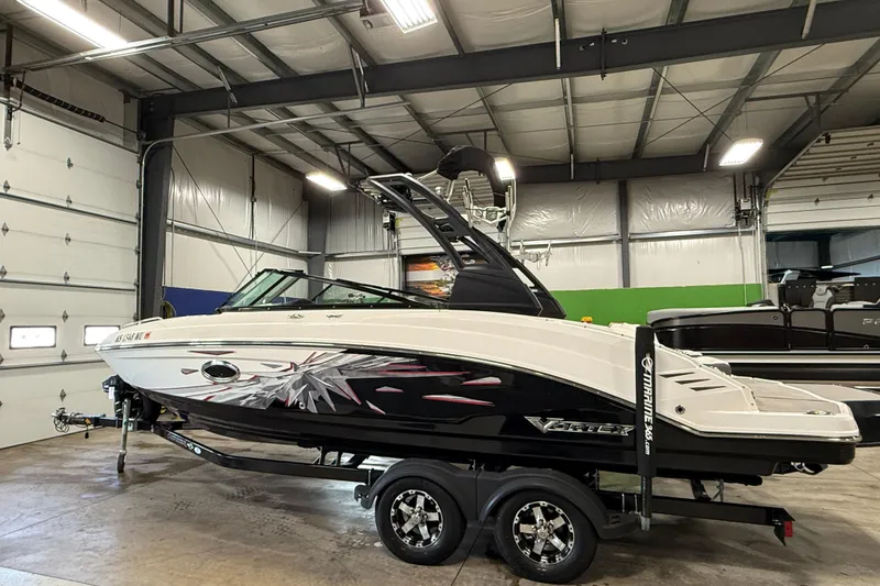 Slide: The Image of 2019 Chaparral Vortex 2430 VRX Wake Series boat in indoor storage facility. - 4