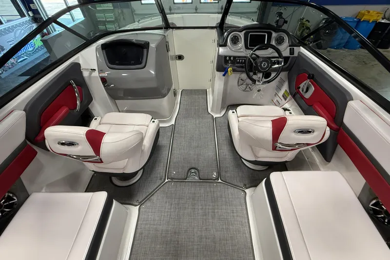 Slide: The Image of Interior of 2019 Chaparral Vortex 2430 VRX Wake Series boat with red and white seating. - 9
