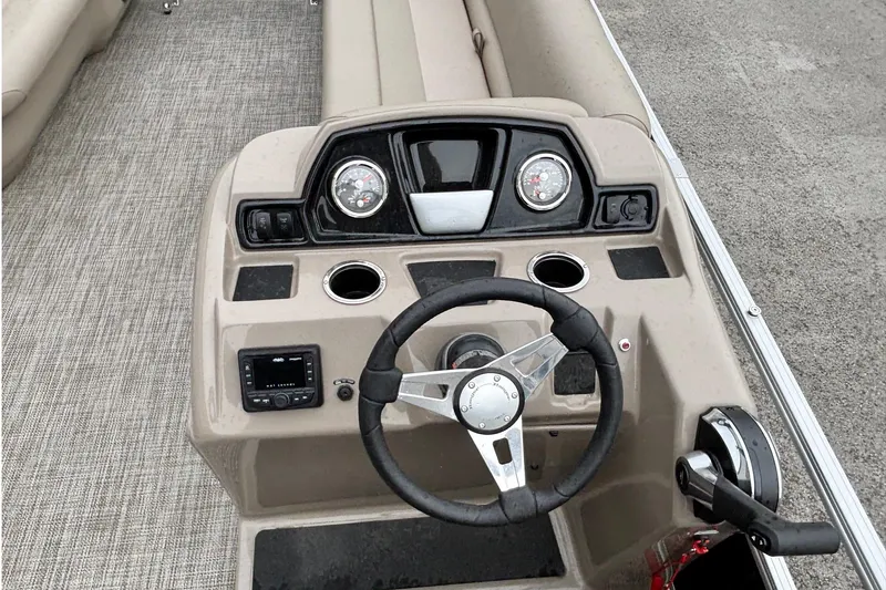 Slide: The Image of Steering console of 2025 Ranger 200C boat with gauges and controls. - 5