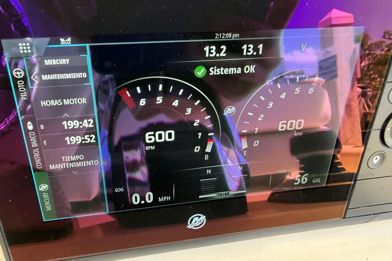 Slide: The Image of Dashboard of a 2019 Boston Whaler 330 Outrage showing engine metrics and system status. - 39