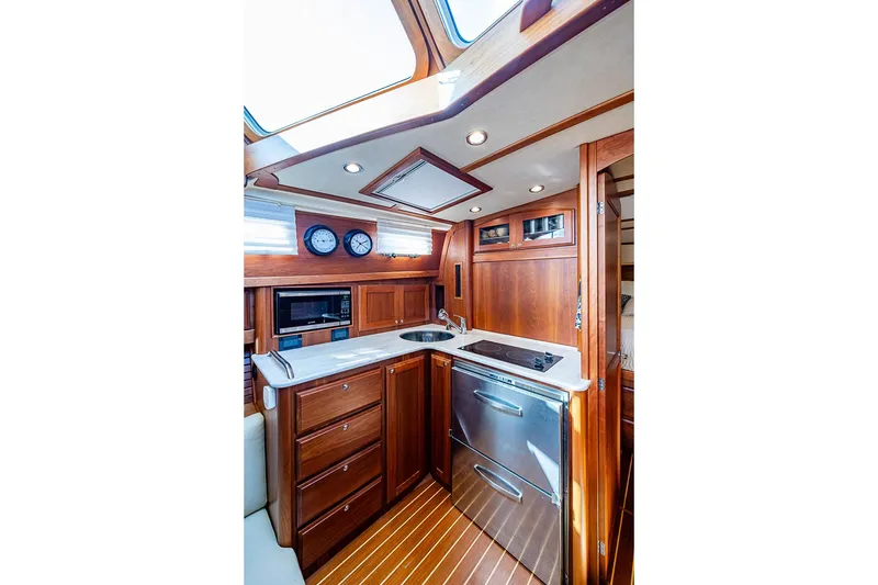 Slide: The Image of Luxurious 2015 Sabre 38 Salon Express yacht interior with modern kitchen amenities. - 12