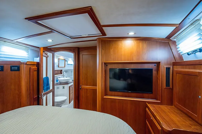 Slide: The Image of Luxurious interior of 2015 Sabre 38 Salon Express yacht with wood paneling and modern amenities. - 15