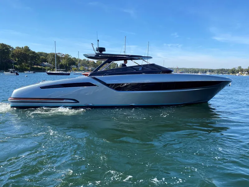 The Image of 2021 Riva Dolceriva 48 luxury yacht cruising on a sunny day. - 1