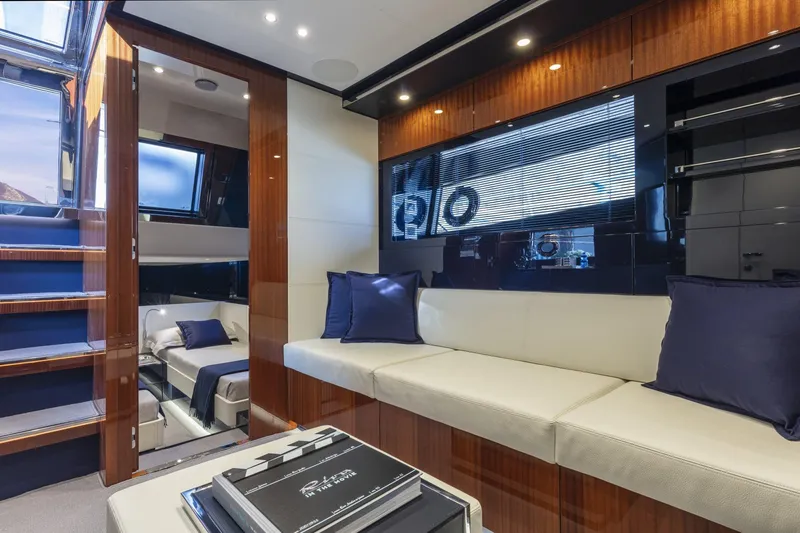 Slide: The Image of Luxurious interior of 2021 Riva Dolceriva 48 yacht with modern seating and elegant decor. - 12