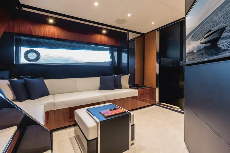 Slide: The Image of Luxurious interior of 2021 Riva Dolceriva 48 yacht with modern seating and elegant decor. - 13