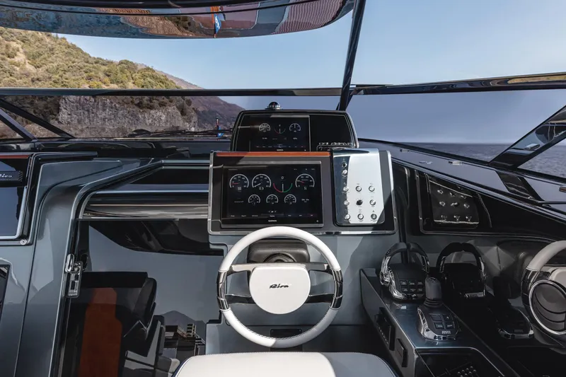 Slide: The Image of Cockpit of 2021 Riva Dolceriva 48 yacht with modern navigation instruments. - 9
