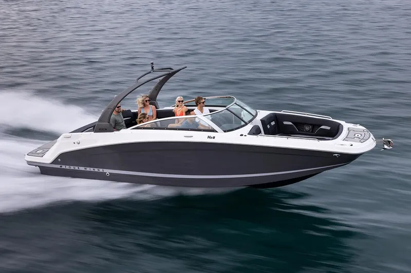 The Image of Manufacturer Provided Image: 2025 Four Winns HD8 boat cruising on open water with passengers enjoying the ride. - 0