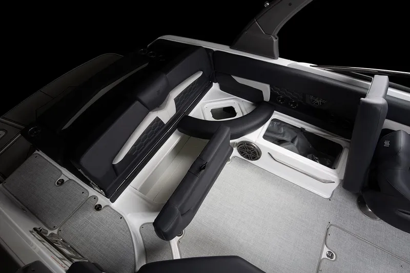 Slide: The Image of Manufacturer Provided Image: 2025 Four Winns HD8 boat interior with sleek seating and storage compartments. - 10