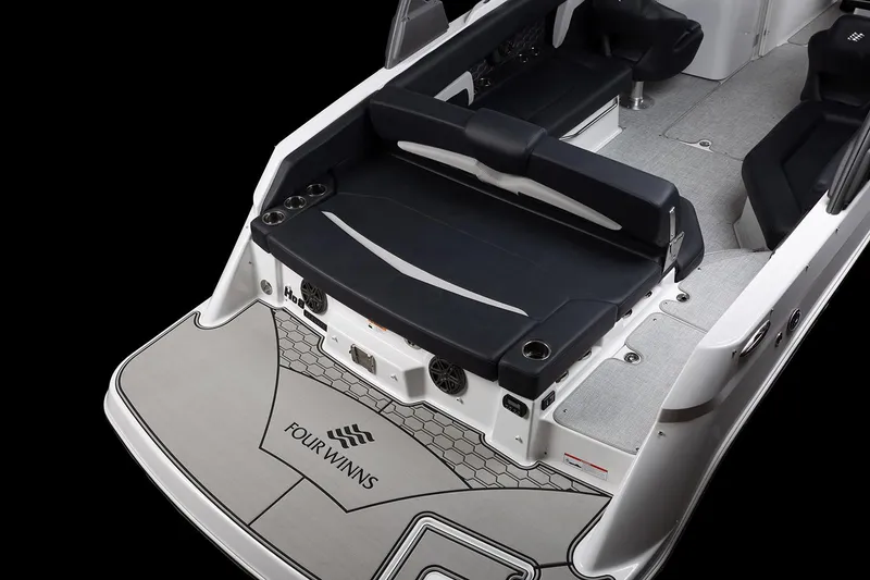 Slide: The Image of Manufacturer Provided Image: 2025 Four Winns HD8 boat interior with sleek seating and modern design. - 12