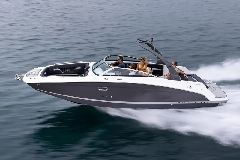 Slide: The Image of Manufacturer Provided Image: 2025 Four Winns HD8 speedboat cruising on open water with passengers. - 2