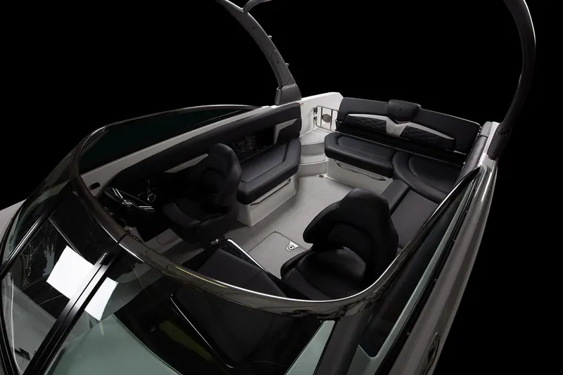 Slide: The Image of Manufacturer Provided Image: 2025 Four Winns HD8 boat interior with sleek black seating and modern design. - 6