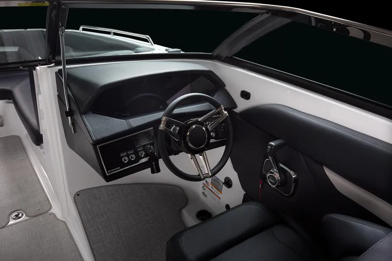 Slide: The Image of Manufacturer Provided Image: 2025 Four Winns HD8 boat interior with sleek dashboard and steering wheel. - 7
