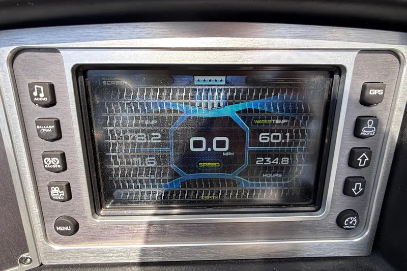 Slide: The Image of 2017 MasterCraft XT23 dashboard display showing speed, water temperature, and operational hours. - 14