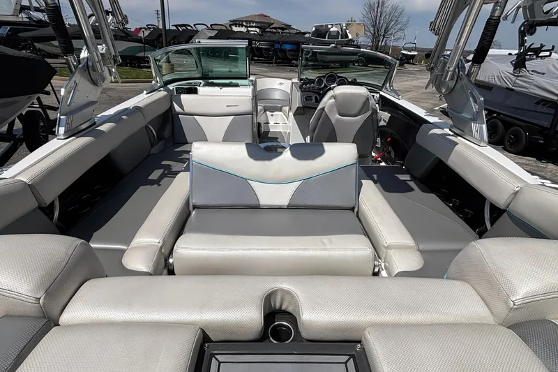 Slide: The Image of 2017 MasterCraft XT23 boat interior with luxurious seating and modern design. - 28