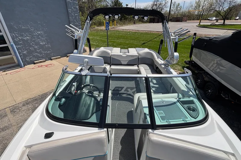 Slide: The Image of 2017 MasterCraft XT23 boat with sleek interior and modern design features. - 52