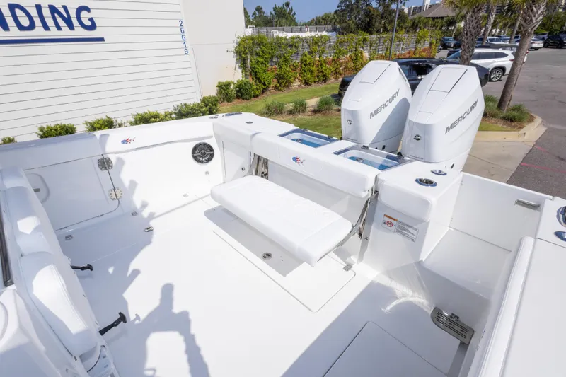 Slide: The Image of 2026 Crevalle 33 CSF boat with dual Mercury engines, spacious deck, and seating. - 37