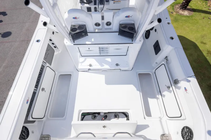 Slide: The Image of 2026 Crevalle 33 CSF boat deck with storage compartments and seating. - 39