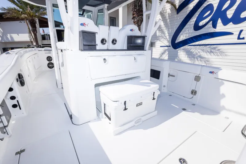 Slide: The Image of Crevalle 33 CSF 2026 boat interior with seating and storage compartments. - 40