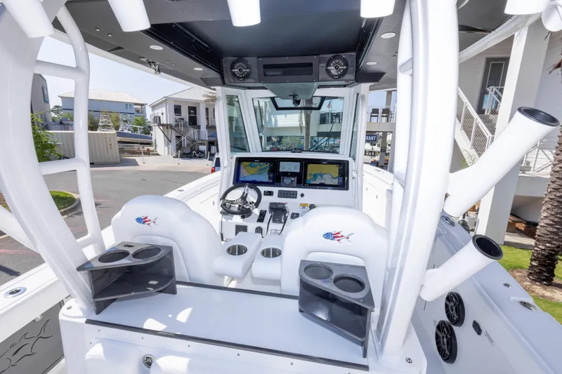 Slide: The Image of Interior view of 2026 Crevalle 33 CSF boat cockpit with modern navigation system. - 46