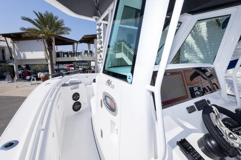 Slide: The Image of 2026 Crevalle 33 CSF boat interior with modern controls and spacious deck. - 47